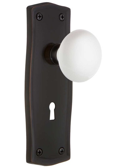 Prairie Design Mortise Lock Set With White Porcelain Door Knobs in Timeless Bronze.